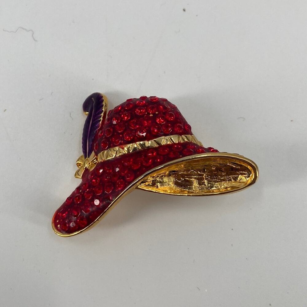 Red hatter gem encrusted pin